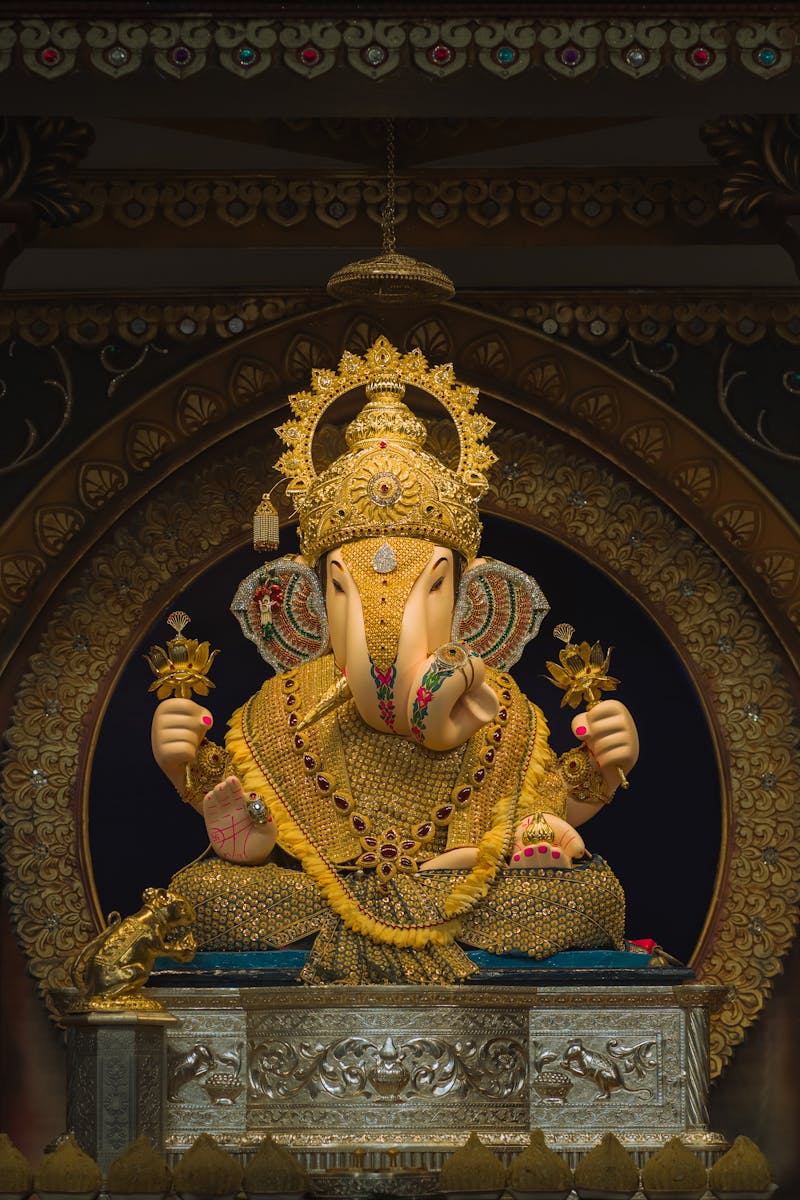 A beautifully decorated idol of Lord Ganesh, showcasing traditional Hindu art and cultural heritage. Captured in Pune, India.