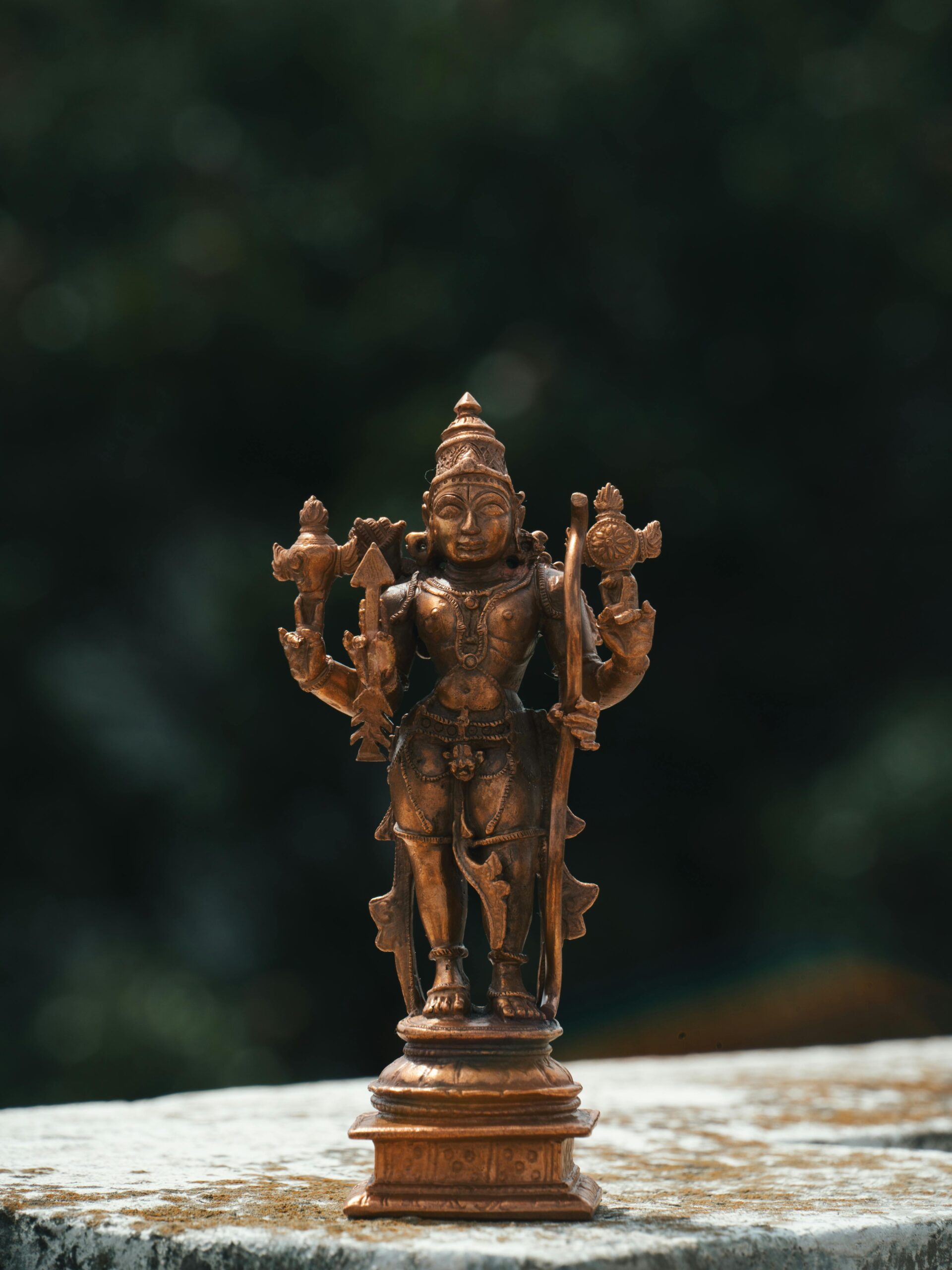 Detailed brass sculpture of a Hindu deity in Bengaluru, showcasing artisan craft and cultural heritage.